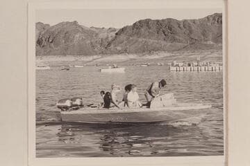 Trial run of "Rattlesnake" on Lake Mead. Fran Belknap and Margaret Marston sit amidships