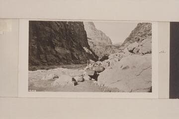 Mattowitteki Rapid. Downstream view of Lava Escarpment Rapids showing the boats "Glen" and "Marble", the last to be lined past this rapid