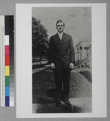 Edwin Powell Hubble as a young man, standing outside in Shelbyville, Kentucky