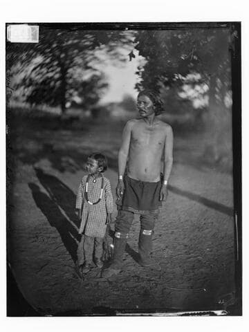 Mr. Growing Horn (Sac & Fox) and his small son, Oklahoma Territory