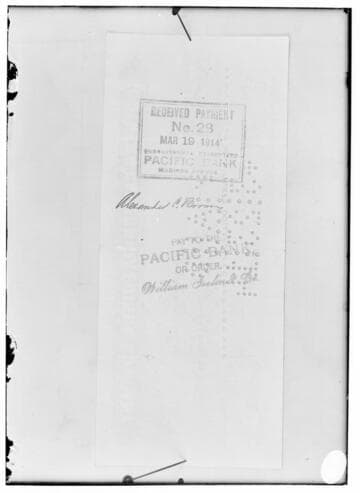 C1.4 - Checks - The back of the check to Alexander C. Brown. [See 02