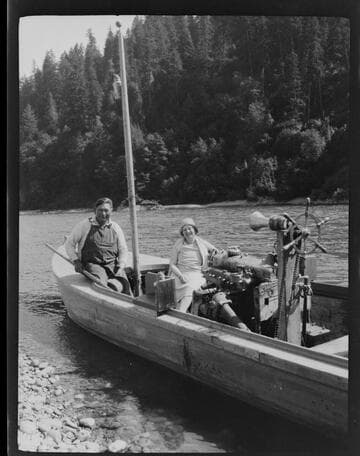 Pete Williams (Yurok) and Grace Nicholson in boat, at Requa