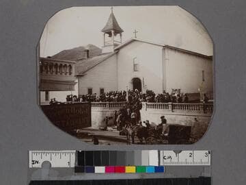 People gathered in front of Mission San Luis Obispo de Tolosa