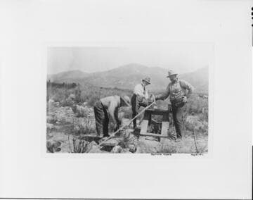 Making a splice in the aluminum and steel cable during construction of the tower line over Cajon Pass in May of 1912