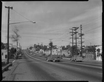 Street scene and streetlights near unknown substation