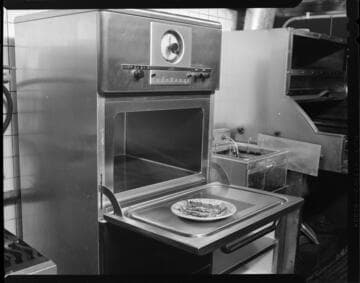 Chef in electric commercial kitchen