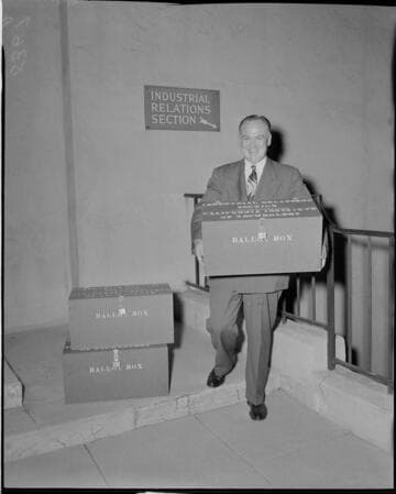Man holding ballot box