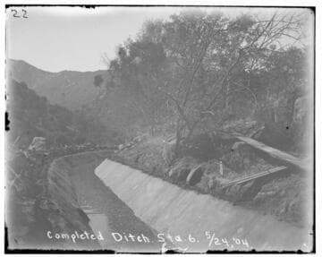 A completed ditch at Station 6 at Kaweah #2 Hydro Plant showing the mountains in the background