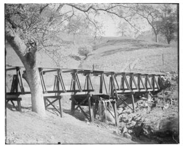 A flume bridging a stream in the mountains