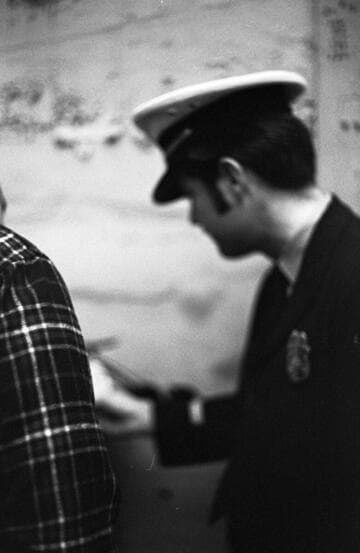 Stake bed truck going through security at Edison facility