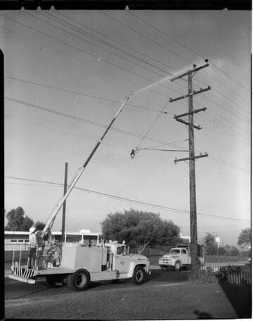 Line truck washing insulators