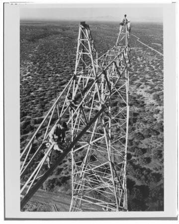 Working over 150 feet above the desert floor, an Edison crew assembles a tower for the Vincent-Lugo transmission line