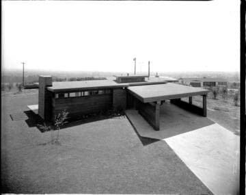 Modern style home with carport