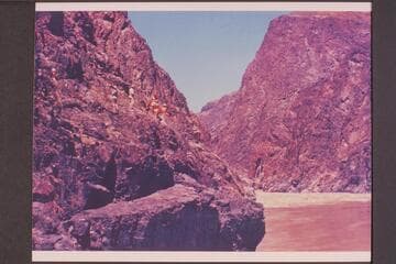 Head of Sockdologer Rapid. Bright Angel gauge: 27,200 cfs. Crew on the rocks for a looksee