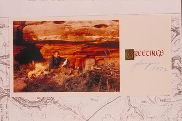 Jorgen Visbak in camp below Ukwalla Point. Xmas card of 1972. Message on back of print