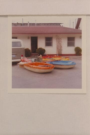 Sportyaks and gear unloaded from Volkswagon prior to Cataract Canyon transit. Moab, Utah