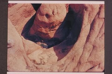 Grotto in canyon at 73+