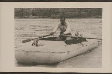 Amos Burg in "Charlie."  Green River, Wyoming.  Raining