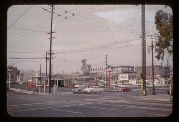 A Standard Oil Station replaces a block of slums