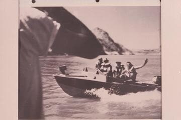 The "BOOTOO" on Lake Mead at foot of Iceberg Canyon. Buzz Belknap at the controls