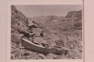The "Ross Wheeler." built by Bert Loper for Charles Russell in 1914 and abandoned at Bass Cable in 1915. She made the water traverse from Greenriver to Bass Cable with extended stops at Hite, Badger Creek Rapid, and below Pipe Creek