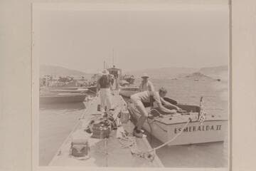 Loading the "Esmeralda" [II] at Boat Dock, Boulder City.  Marston stands on the dock; Ed Hudson watches Edward Hudson