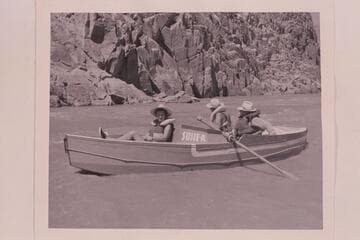 Skiff developed by Reilly for Grand Canyon cruising. Susie and Pat Reilly with Paul Terry; approximately Mile 105
