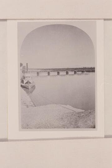 Southern Pacific bridge at Yuma. The river steamer "Gila" is moored above the bridge