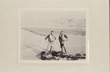 Bill Beer and John Daggett at the end of their traverse of the Grand Canyon.  Grapevine Wash.  The rubber bags held gear and food and provided flotation