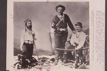 Powell all dressed in costume and Kentucky Mountain Bill with Jesus Alviso seated