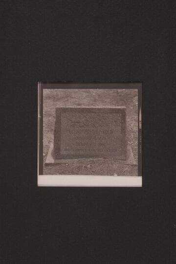 Marker on grave of Ellsworth Kolb in cemetery at South Rim.  "Born January 4 1876/Died January 9 1960."  [photographed] in a snowstorm