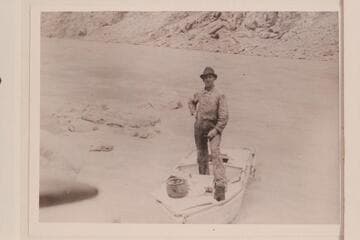 Jake Jeffs standing on the "Titanic II" at Pipe Creek.  Jeffs was a member of the Russell-Tadje party for one day