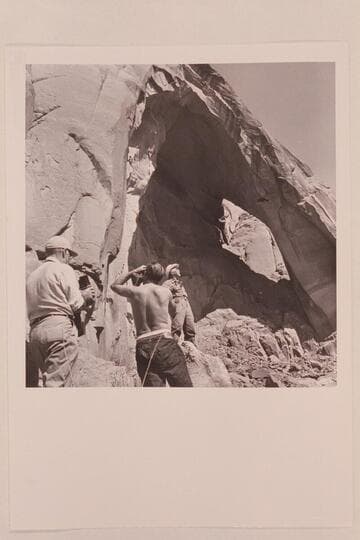 Marston and Visbak photographing Masland enjoying the fact that the arch proved to be Arch in the Sky. Used in Las Vegas Sun