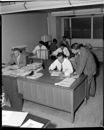 Men working in an office