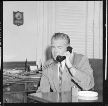 Portrait of unknown man at his desk with 20 variants