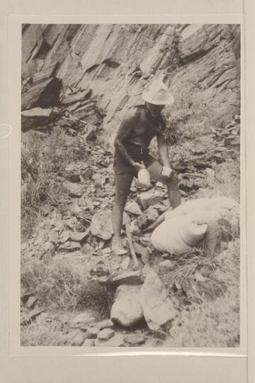 Dock Marston picks up items from plane-drop halfway to the top of the Archean at Mile 99 1/2