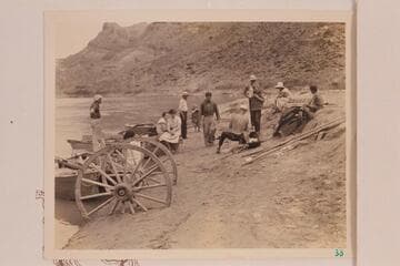 Launching and loading skiffs for the Dusty Dozen cruise of 1934. Bus Hatch moves toward camera at center, Frank Dodge at Bus' left