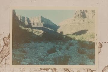 Up Bridge Canyon. The trail goes up left and through the notch