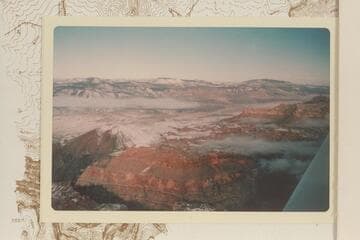 Across Toroweap Valley. Mt. Emma upper left; Mt. Logan upper center; Mt. Trumbull upper right; Vulcans Throne lower left