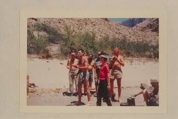 Garth Marston sings a verse of the Disney story by the non-Disney crew. Mile 205. Jeff is in the red shirt. Rod Sanderson; Larry Sanderson; Bob Malott at the read