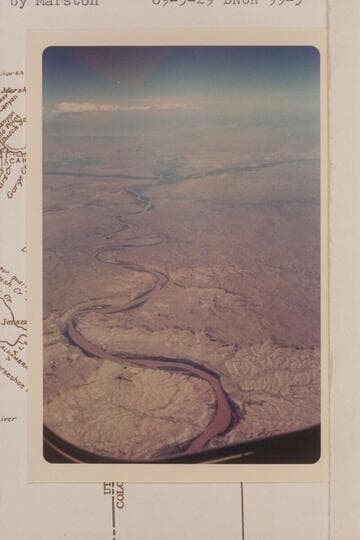 Up Green River from Mile 99 in Desolation Canyon. The greenery at left and right in the distance marks the Duchesne and White Rivers