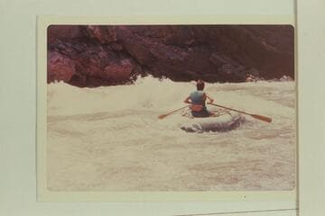 Small inflated unit in 232 Mile Rapid. Ed Herrman, Howard Booth and Jorgen Visbak were joined at Diamond Creek, John Mercier and Geoffrey plus Roy Evans in a kayak