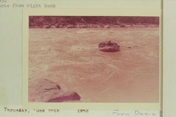 Bill Davis in his 7-man inflated boat pulling out below Disaster Rapid. Photo from right bank