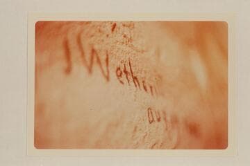 Wetherill inscription in crack of boulder, Rainbow Bridge