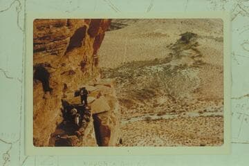 Arizona: Grand Canyon view from mouth of Meriwitica Cave. Note ruin, on wall at left. Meriwitica Spring at upper right