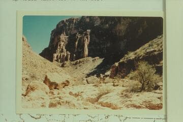 Entering first narrow gorge in Granite Park Canyon en route out from Granite Park. A trail takes off to the left