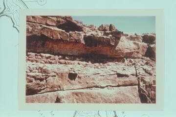 Granary under the rim between Miles 45 and 46, right bank. From Lynn Roberts' helicopter