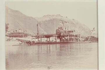 Stacker ladder ready to raise dredge of the Hoskanini Mining Co