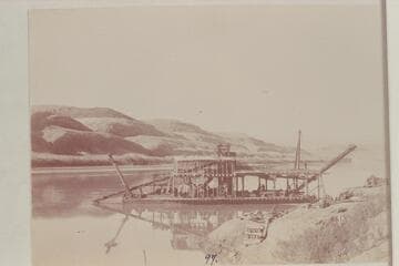 Stacker ladder up on the dredge of the Hoskanini Mining Co., Camp Stone, Glen Canyon