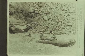 Don Hatch pontoon in Hance Rapid. Don Hatch at the bow in operation which they designate as coxswain. Clark and Bruce Lium at the oars